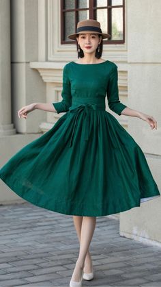 The rich emerald hue exudes sophistication, while the three-quarter sleeves add a touch of modest allure. The cinched waist creates an hourglass shape, and the flowing skirt ensures graceful movement as you glide across the room. 
Get ready to turn heads and leave a lasting impression in our “Emerald Elegance” dress. It’s not just an outfit; it’s a statement of refined taste and elegance. 🎉 

SKU 4897
Link in bio

#SwingDress #FlareFashion #MidiDress #SummerFashion #FlowingSkirt #LinenFashion Beautiful Frocks, Elegance Dress, Army Green Dress, Graceful Movement, Tailored Clothes, Simple Black Dress, Linen Dress Women, Linen Fashion, Green Fits