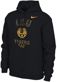 Put your Tigers spirit on display in this LSU Tigers Long Sleeve Hoodie! You'll be cozy on game day in this LSU Mens Black Camo Veterans Day Hooded Sweatshirt. This Tigers Long Sleeve Hoodie features a screen print team name arched over team logo in Camo print on front chest with United States flag on left sleeve. Wear your LSU Tigers spirit with pride in this great Mens Hooded Sweatshirt! Ultra comfy cotton blend, Graphic on chest, Medium-Weight, Drawstrings at neck, Kangaroo pockets, Ribbed cu Nike Cotton Hoodie With Graphic Print, Fan Apparel Cotton Sweatshirt With Kangaroo Pocket, Cotton Fan Apparel Sweatshirt With Kangaroo Pocket, Nike Cotton Hoodie With Letter Print, Nike Cotton Sweatshirt With Graphic Print, Nike Black Cotton Hoodie, Nike Cotton Sweatshirt With Kangaroo Pocket, Cotton College Top With Kangaroo Pocket, Nike Cotton Hoodie For Fan Gear