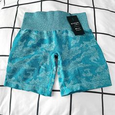 Nwt Nvgtn Teal Camo Pro Seamless Gym Shorts Size Xs S M Womens Nwt Never Worn No Flaws Check Out Page For Other Colors! High Stretch Blue Athletic Shorts For Summer, Seamless Summer Shorts For Training, Blue Compression Shorts With Breathable Fabric, Blue Stretch Breathable Athletic Shorts, Blue Stretch Breathable Shorts, High Stretch Breathable Blue Shorts, Breathable Blue Workout Shorts, Breathable Blue Shorts For Workout, Blue Breathable Fitted Athletic Shorts