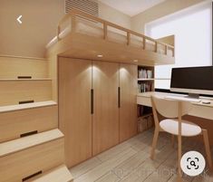 there is a computer on the desk in this small room with stairs to the second floor