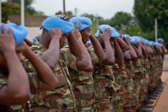 the soldiers are wearing blue gloves to protect their eyes