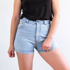 Vintage high waist shorts jeans in light blue of the 90's. This vintage women denim shorts has classic and streetstyle. The shorts is cotton fabric by John F. Gee in perfect vintage conditions. The modern size of this denim short is Medium - the waist contour fit is 29,9 in (76 cm) ** MEASURES FLAT ** Waist 14,9 in // 38 cm Hip 19,6 in // 50 cm Rise (front) 11,4 in // 29 cm Rise (back) 14,5 in // 37 cm Inner leg 2,7 in // 7 cm Length 13,3 in // 34 cm Bottom width 11,4 in // 29 cm Reference: Mode Retro Short Denim Shorts, Retro Denim Jean Shorts For Summer, Retro Style Medium Wash Shorts For Summer, Retro Medium Wash Shorts For Summer, Vintage Medium Wash Shorts For Summer, Vintage Light Wash Shorts For Summer, Vintage Medium Wash Summer Shorts, Fitted High Waist Light Wash Jean Shorts, 90s High Rise Shorts For Summer