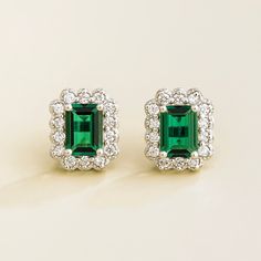 Verda earrings in 18K white gold vermeil set with Emeralds and Diamonds.  Emeralds: ~1. 6 carats (7mm x 5mm emerald cut) Diamonds D-F VS+ grade: ~0. 7 carats Each earring dimensions: 11. 3mm height x 9. 1mm width x 4. 3mm depth Options available in 9K, 14K and 18K gold and additional sizes available, please contact Juvetti. See matching Verda necklace Our precious jewellery is designed to preserve its original brilliance over time. There are a few precautions to make sure to keep your jewellery Elegant Green Diamond Earrings With Brilliant Cut, Elegant Green Platinum Jewelry, Luxury Green Diamond Earrings In Sterling Silver, Luxury Green Sterling Silver Diamond Earrings, Green Sterling Silver Luxury Diamond Earrings, Elegant Emerald Diamond Earrings In White Gold, Luxury Sterling Silver Diamond Earrings With Halo Design, White Gold Platinum Gemstone Earrings, Elegant Emerald Diamond Earrings