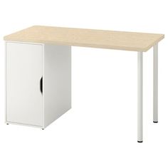 an office desk with a white cabinet and black handles on the bottom, in front of a white background