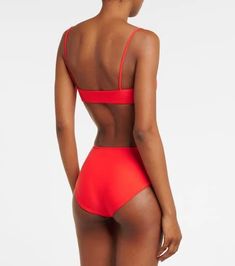 Material: 78% nylon, 22% elastane.Care instructions: hand wash.Made in the USA.Designer color name: Coral.True to size.Cup size: A/B.Minimal coverage.If you wear a C cup or bigger, we recommend trying one size larger.The model seen in the picture is 178cm-5'10', cup size B, and wearing a size XS Underwire Swimwear For Summer Workout, Sporty Polyamide Swimwear For Swimming, Stretch Nylon Swimwear With Padded Cups, High Stretch Athleisure Swimwear For Beach, Padded Stretch Nylon Swimwear, Sporty Solid Swimwear With Padded Cups, Sporty Nylon Swimwear With Padded Cups, Sporty Swimwear With Padded Cups For Swimming, Sporty Padded Swimwear For Swimming