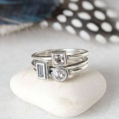 "Know someone with an April birthday ~ this is the perfect gift! Stackable birthstone rings are the IT accessory. Wear by itself or pair with with an initial ring! **This listing is for one sterling silver stackable birthstone ring with a clear/diamond color Swarovski crystal. Available in Round, square, rectangle, marquise, heart or cross stone settings.** Also available in January, February, March, April, May, June, July, August, September, October, November, or December here: https://www.etsy Modern Stackable Toe Rings For Gifts, Modern Stackable Birthstone Ring For Everyday, Modern Everyday Stackable Rings With Birthstone, Modern Everyday Stackable Birthstone Ring, Everyday Modern Stackable Rings With Birthstone, Minimalist Stackable Rings For Gift, Minimalist Stackable Rings For Gifts, Everyday Stackable Open Rings With Birthstone, Minimalist Silver Birthstone Ring For Everyday