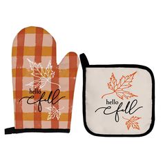 two oven mitts with the words hello fall on them