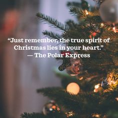 a christmas tree with the quote just remember, the true spirit of christmas lies in your heart