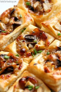 small pizzas with mushrooms and cheese on a white plate, ready to be eaten