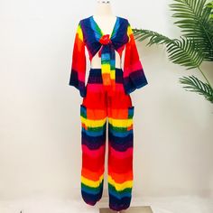 Pride Two Piece Set, Rainbow Unisex Pants, Bell Sleeve Flare Top, LGBTQ + Pride Fashion, Pride Boho Pants, Bright Colorful Festival Fashion  This unique handmade Bright Pride Colorful Pant and Bell Sleeve Top Set is the perfect way to represent your pride. The Rainbow Pride set comes with high-crotch pants and a three-way bell sleeve top to let your creativity shine through. Show your true colors with this amazing set. Handmade Material: Rayon Size: Free Size; Fits Upto US Size Large Adjustable Waist Two Side Pockets Multicolor High Waist Harem Pants For Summer, High Waist Multicolor Harem Pants For Summer, Summer Party Cotton Pants, Fitted Multicolor Sets With Long Pants, Fitted Multicolor Long Pants Sets, Multicolor Party Pants For Summer, Summer Party Multicolor Pants, Pride Fashion, Colorful Festival