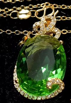 Presenting a Truly Charming vintage~style necklace with a perfectly cut green tourmaline & white Gemstones Pendant. Beautifully Crafted in 18K gold plate, Stunning, vibrant colours. A perfect Gift this Christmas for someone special. Please, if you have any questions, do not hesitate to ask me. Thank you for your kind attention. 🐝Just a quick note:  Each item of jewellery sold, has free U.K. postage & comes with either a gift pocketbox or a drawerstring bag, free! 🌷I like to add an extra touch of happiness, for each of my customers 🌞 Some of my items, do already come along with their original boxes. Any questions, Im always here to help! Thank you wonderful people. PM me if you have a preference, if not I will select a lovely one, from my range. Best Wishes, as always, Joanne 🌻 Green Tourmaline Pendant Jewelry, Green Pendant Gemstones For Formal Occasions, Formal Green Tourmaline Necklace, Elegant Green Tourmaline Necklaces, Elegant Green Tourmaline Necklace, Elegant Green Tourmaline Gemstones, Green Tourmaline Necklace In Fine Jewelry Style, White Gemstones, Gemstones Pendant