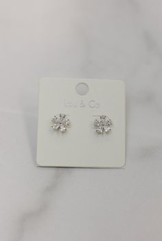 Our delicate Flower Post Studs feature intricately crafted blossoms that add a touch of elegance and femininity to any outfit. These dainty studs are perfect for everyday wear or special occasions, bringing a blooming beauty to your accessory collection. Silver Feminine Flower Earrings For Formal Occasions, Flower Cluster Earrings For Wedding, Delicate Cubic Zirconia Flower Earrings For Formal Occasions, Classic Cubic Zirconia Flower Earrings, Silver Dainty Flower Earrings For Party, Dainty Silver Flower Earrings For Party, Flower Cluster Earrings For Party, Formal Flower Earrings With Flower Charm, Flower-shaped Bridal Earrings With Flower Charm