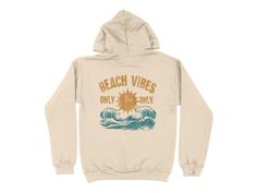 Embrace the summer vibes with our "Beach Vibes Only" Hoodie, perfect for women ready to enjoy sun, sea, and sand. Featuring a stylish back print of waves and sun, this hoodie adds a casual, cozy touch to your summer wardrobe. Great for beach outings, casual hangouts, or just lounging in style. Make a statement with this trendy and seasonal design. Product Features: Fabrication: Medium-heavy fabric (8.0 oz/yd² (271 g/m 50% cotton, 50% polyester Seams: Without side seams Fit: Classic Fit Sizing: A Back Print Hoodie, Summer Hoodie, Summer Apparel, Retro Sun, Beach Wave, Design Hoodie, Hoodie For Women, Summer Design, Beach Vibes