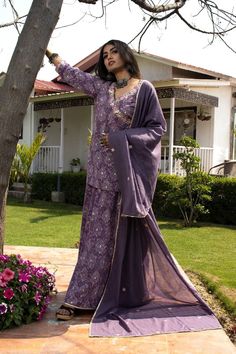 This mul mul set is a angrakha kurta with shrara pants and mul mul dupatta embroidered with gota work making it perfect for summers. Chanderi Sharara With Resham Embroidery, Eid Chanderi Palazzo Set With Gota Work, Chanderi Sharara With Mirror Work And Straight Kurta, Anarkali Purple Palazzo Set With Gota Work, Eid Anarkali Sharara With Mirror Work, Navratri Straight Kurta Sharara With Resham Embroidery, Straight Kurta Sharara With Resham Embroidery For Navratri, Navratri Resham Embroidery Sharara With Straight Kurta, Chanderi Sharara With Gota Work And Straight Kurta