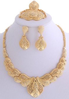 "Unique and simply stunning statement jewelry, spice up any outfit with this gorgeous accessory for all occasion. Super cute! New Gold Plated Metal Necklace Bracelet Earring Set / Necklace Approx 4.5\" Diameter / Earring: Post-Clip / Bracelet: approx: 2.5\" D / Ring: Adjustable / Color: Gold Product contains 5 items: 1 Necklace, 2 Earrings, 1 Ring and 1 Bracelet.  Party wear, ceremonial occasion, African Party, wedding, birthday and More!  Quick Note; Stock Photo is high contrast picture with high definition color grade." Metal Art Work, Bracelet Party, Afternoon Quotes, Cad Cam, 2 Earrings, Studded Necklace, Metal Necklace, Gold Jewellery Design Necklaces, Earring Post