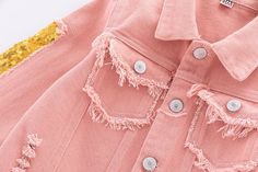 Bestselling beautiful and unique rainbow sequin light pink denim jacket! Light pink denim jacket with beautiful gold sequins on the sleeves and rainbow on the back. Silver button front and sleeves. Denim fringe and worn patches on the front, bottom and pockets of jacket. Girls' sizes 5T-12Y. *limited stock* Good things take time: Quicker shipping: this jacket ships directly from our overseas warehouse. Once shipped, it will arrive in your mailbox in approximately 7-12 business days. Summer Pink Long Sleeve Denim Jacket, Pink Summer Denim Jacket With Pockets, Summer Pink Denim Jacket With Pockets, Pink Cotton Denim Jacket For Spring, Pink Sequined Outerwear For Spring, Trendy Pink Cotton Denim Jacket, Spring Denim Jacket With Sequins Long Sleeve, Spring Sequined Long Sleeve Denim Jacket, Spring Denim Jacket With Sequins And Long Sleeves