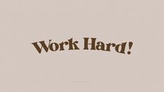 the word work hard written in brown on a beige background