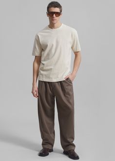 Color: Cocoa Midweight woven fabric Regular fit Front pleat detailing Belt loops Side seam pockets Zip fly Front button closure Partially lined 65% Polyester 20% Rayon 15% Wool Dry Clean Imported Pants With Pockets And Straight Hem For Casual Wear, Relaxed Fit Ankle Pants With Pleated Waist, Business Casual Pleated Cotton Bottoms, Straight Hem Pants With Pockets For Casual Gatherings, Relaxed Fit Pleated Waist Ankle Pants, Cotton Wide Leg Bottoms With Pleated Waist, Cotton Wide Leg Pants With Pleated Waist, Pleated Cotton Bottoms For Business Casual, Casual Beige Pleated Pants