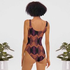 Indulge in the exquisite beauty of our African Print Bathing Suits One Piece. Made with vibrant African prints, this bathing suit will make you stand out in any pool or beach setting. The one-piece design provides optimal coverage and comfort, while the intricate patterns add a touch of culture and elegance. Elevate your swimwear collection with this exclusive piece. Product Features Please Compare your Measurements To our Size Chart Before Purchase • 82% Polyester, 18% Spandex• Fabric weight: 6 Fitted Printed One-piece Beachwear, African Print Swimsuit, Beautiful Swimwear, Beach Setting, Printed One-piece Beachwear Bodysuit, Stretch Leopard Print One-piece Swimwear, Printed V-neck Beachwear One Piece, Bathing Suits One Piece, Skirt Swimsuit