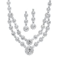 PRICES MAY VARY. LUXURY STYLE: Mariell Petite Size Glamorous Double Strand Rhinestone Necklace and Earrings Set, Double Strand Necklace with Matching Shimmery Dangles, Head Turning Bling PERFECT SIZE: Adjustable Statement Necklace for Petite Women Measures 12" to 16", Center of Necklace Measures 1 1/2" High , Graduated Earrings are 1 3/4" Long, Posts with Comfort Disc Backs QUALITY DESIGN: Stones are Top Quality Prong-Set Austrian Crystal Rounds Framed with Rhinestone Crystals MADE WITH LOVE: De Indian Jewelry Sets, Prom Jewelry, Necklace And Earrings Set, Rhinestone Bridal, Bridesmaid Necklace, Rhinestone Jewelry, Brides And Bridesmaids, Bridal Jewelry Sets, Bridal Necklace