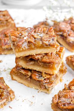 several pieces of pecan pie stacked on top of each other