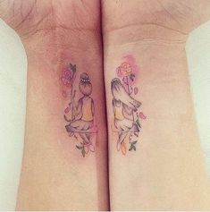 two matching tattoos on the arms of women with flowers and birds in their bodys