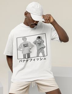 White Anime Print T-shirt For Fans, White Anime T-shirt With Letter Print, White Cotton T-shirt For Fan Events, Anime Print Crew Neck Tops For Fandom, White Harajuku T-shirt With Front Print, White Pre-shrunk Fandom T-shirt, Casual T-shirt With Screen Print For Fan Gatherings, Anime Print Fandom T-shirt For Fan Gatherings, Cotton T-shirt With Anime Print For Fan Gatherings