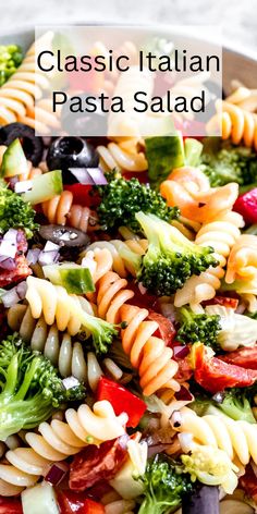 a close up of a pasta salad with broccoli