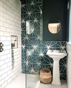 the bathroom is decorated in black and white