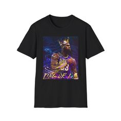 Introducing the Lebron James Graphic T-Shirt, the epitome of style and athleticism in basketball fashion. Elevate your presence on the court or in public with this meticulously crafted shirt. Uniting innovation and trendsetting design, this shirt will redefine your game and appearance in one seamless package. This product is made especially for you as soon as you place an order, which is why it takes us a bit longer to deliver it to you. Making products on demand instead of in bulk helps reduce Fan Apparel Tops With Sublimation Print For Streetwear, Urban Tops With Graphic Print For Sports Season, Urban Style Tops With Screen Print For Sports Events, Fan Apparel Tops With Graphic Design For Sports Events, Graphic Design Fan Apparel Tops For Sports Events, Graphic Print Shirt For Sports Season Streetwear, Hip Hop Tops With Graphic Print For Sports Season, Basketball Fan Apparel Tops With Short Sleeves, Sublimation Print T-shirt For Sports Season Streetwear