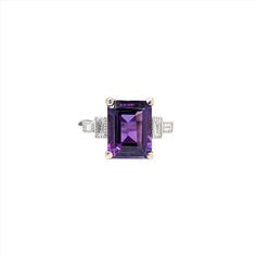 This Deep Purple Amethyst Ring is an elegant and timeless accessory crafted in solid 14k white gold. The emerald cut 10x8mm center stone is highlighted by sparkling baguette diamond accents. Perfect for February birthdays or to make a statement. Luxury Faceted Amethyst Ring In Fine Jewelry Style, Luxury Classic Emerald-cut Amethyst Ring, Luxury Emerald-cut Diamond Amethyst Ring, Elegant Luxury Faceted Amethyst Ring, Luxury Lavender Amethyst Ring - Fine Jewelry, Designer Silver Jewellery, Purple Amethyst Ring, Jewelry Showcases, Timeless Accessories