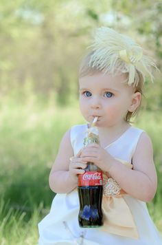 How adorable is she!! Photo Source: Weddingbells #flowergirl #ShareaCokeContest Baby Wedding Dress Pictures, Coke Cans In Hair Photoshoot, Wedding Photo Ideas Bride And Flowergirl, Toddler In Wedding Dress Photo Shoot, Carnival Wedding Theme, Flower Girl Inspiration, Pony Photoshoot Children, Carnival Wedding, Gettin Hitched