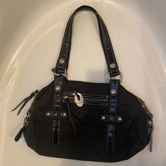 Vintage Emma Q Large Black Purse. Made Of Nylon With Vinyl Trim Which Looks Like Patent Leather Measures Approximately Lying Flat 13 Inches Tall 15 Inches Wide 11 Inch Strap Strap New Without Tags, I Received This As A Gift And Never Used It Smoke-Free Business Cheap Y2k Black Shoulder Bag, Black Heart-shaped Shoulder Bag For Everyday Use, Ysl Kate Bag, Luxury Black Patent Leather Shoulder Bag, Large Black Purse, Vintage Black Patent Leather Handbags, Ysl Kate, Sparkly Purse, Kate Bags