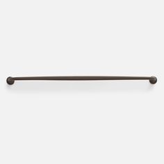 an old style pull handle on a white wall with no background or image to describe