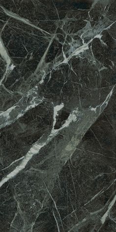 black marble textured with white vein lines