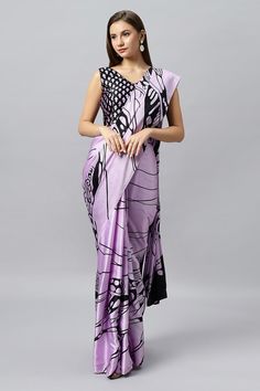 Lavender geometrical jaal (net) & motifs Digital printed saree. This saree is made using modal satin, making it stylish yet elegant.  An elegantly draped saree with sheen to enhance its allure. As each saree is in Digital Print slight color variations are likely to come into existence. These variations or irregular Silk Pre-draped Printed Saree, Party Saree With Digital Print In Traditional Drape, Elegant Printed Saree For Festive Season, Elegant Printed Saree For Festive Occasions, Elegant Festive Printed Saree, Festive Elegant Printed Saree, Festive Digital Print Saree For Party, Festive Party Saree With Digital Print, Purple Bollywood Saree For Evening