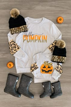 *Each top sold separately* Long sleeve design makes it a perfect pick all Fall Mom & child tops both feature a heather gray design with cheetah accents Mom top reads "Hello Pumpkin" & child top features a cute jack-o-lantern graphic Ultra soft material for comfort & ease Twinning is winning, especially with your mini BFF. These "Hello Pumpkin" Gray Cheetah Tops feature long sleeves and a fun saying or pumpkin design embossed on the front. In a versatile heather gray design, this top is made from Mommy And Me Fall Outfits, Hannah Mae, Matching Mommy Daughter Outfits, Cheetah Top, Classic Baby Clothes, Mom Daughter Outfits, Mommy Daughter Outfits, Daughter Outfits, Top Reads