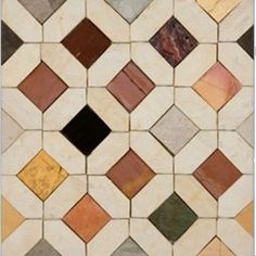 an image of a tile design with different colors and shapes on it's surface