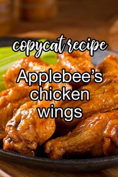 an image of chicken wings on a plate with the words copycat recipe applebee's chicken wings