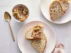 two white plates topped with slices of bread