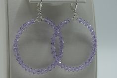 "Light purple Swarovski Crystals are used to design this stunning pair of hoop earrings. The 4mm crystals are on a sturdy rounded wire which dangles from a sterling silver plated lever back ear wire. These earrings will dangle approximately 2\" from the base of the ear wire. The diameter of these hoops is 1 3/4\". The lever back ear wires are so comfortable you might forget that you have them on." Poughkeepsie Ny, Earrings Purple, Large Crystal, Purple Earrings, Swarovski Crystal Earrings, Large Hoop Earrings, Swarovski Earrings, Cute Bracelets, Large Crystals