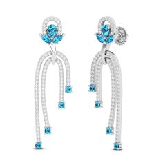 Each earring is a miniature masterpiece, meticulously designed to reflect the opulence and elegance of bygone eras. Adorned with intricate carvings, delicate filigree, or vibrant gemstones, these earrings embody a sense of cultural heritage and timeless allure. Diamond weight is 0.82 & color stone weight is 0.50 NET WEIGHT (10K):4.58 NET WEIGHT (14K):5.15 NET WEIGHT (18K):6.16 Luxury Topaz Earrings For Formal Occasions, Luxury Blue Topaz Drop Earrings, Luxury Blue Topaz Earrings, Luxury Topaz Earrings For Wedding, Elegant Blue Topaz Earrings With Prong Setting, Luxury Topaz Drop Earrings, Luxury Silver Topaz Earrings, Luxury Blue Topaz Earrings With Prong Setting, Amethyst Earrings Gold