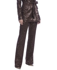 BSP3365 | Side Zip Line Sequin Bootcut Pant The Side Zip Line Sequin Bootcut Pant is your ticket to a night filled with endless compliments. This rich, chocolate-sequin stunner gives you that just-right shimmer complete with an easy, tailored flow. The result is a party piece that perfectly balances boldness and chic, only outshined by the confidence you bring when you wear it. Product Features The line sequin fabric glows with every move, creating a luminous, show-stopping effect. A sleek, hidd Flat Booties, Jewel Badgley Mischka, Zip Line, Denim Suit, Bootcut Pants, Sequin Fabric, Diamond Fashion, Badgley Mischka, The Line