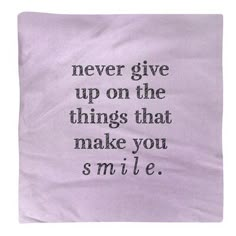 a napkin with the words never give up on the things that make you smile