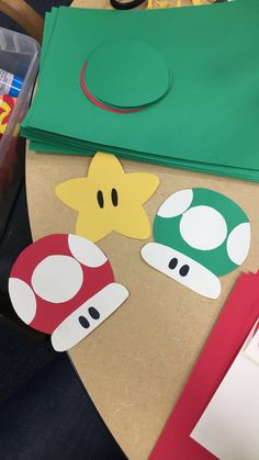 a paper bag sitting on top of a table next to some scissors and other items