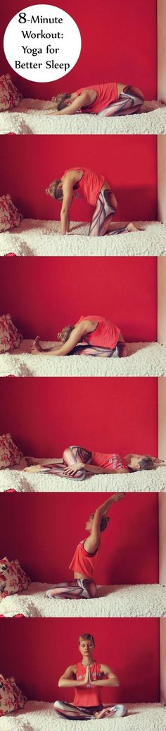 a woman is doing yoga on top of the bed in front of a red wall