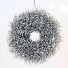 a silver wreath hanging from the ceiling