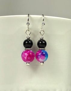 "These pretty earrings measure 7/8\" (approx. 2.22 cm) in length and feature lovely pink & blue watercolor glass beads and black glass beads, with silver accents and earwires. Great for everyday wear! Orders typically ship out within 1-2 business days after payment has cleared.    Thank you for stopping by! I'm adding new items regularly so please favorite my shop if you see anything you like!" Watercolor Earrings, Earring Ideas, Black Earrings, Pretty Earrings, Blue Watercolor, Silver Accents, Pink And Black, Diy Jewelry Making, Black Glass