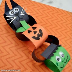 a paper roll with a cat and pumpkin on it