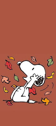 a drawing of a snoopy dog with autumn leaves falling from his mouth on the ground